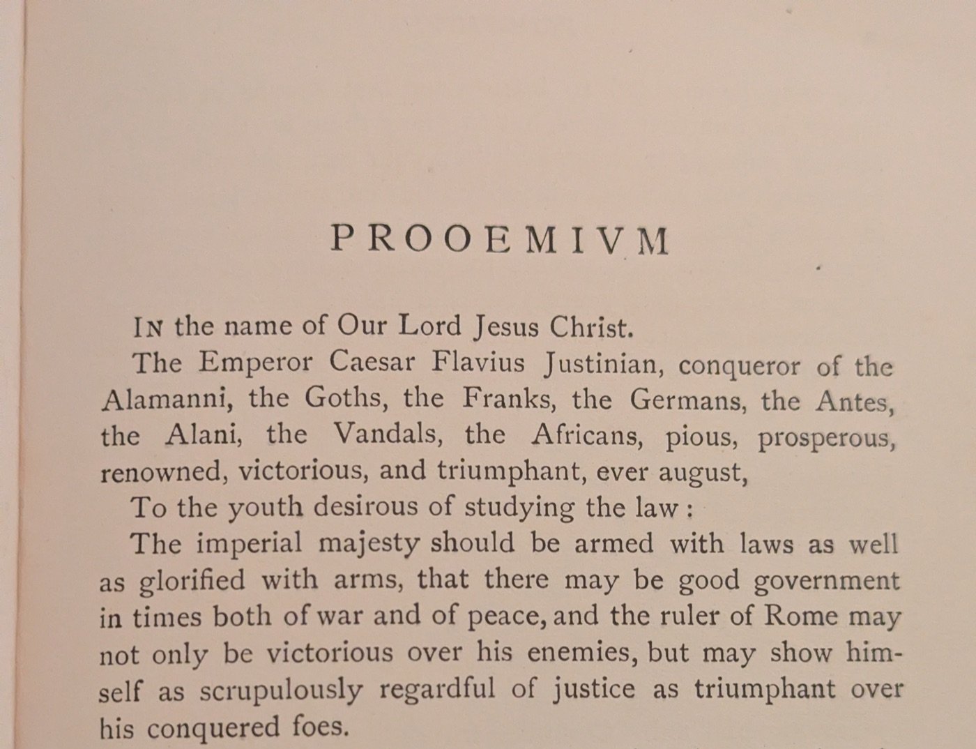 The Prooemium page of Moyle's translation of the Institutes, beginning: The imperial majesty should be armed with laws as well as glorified with arms